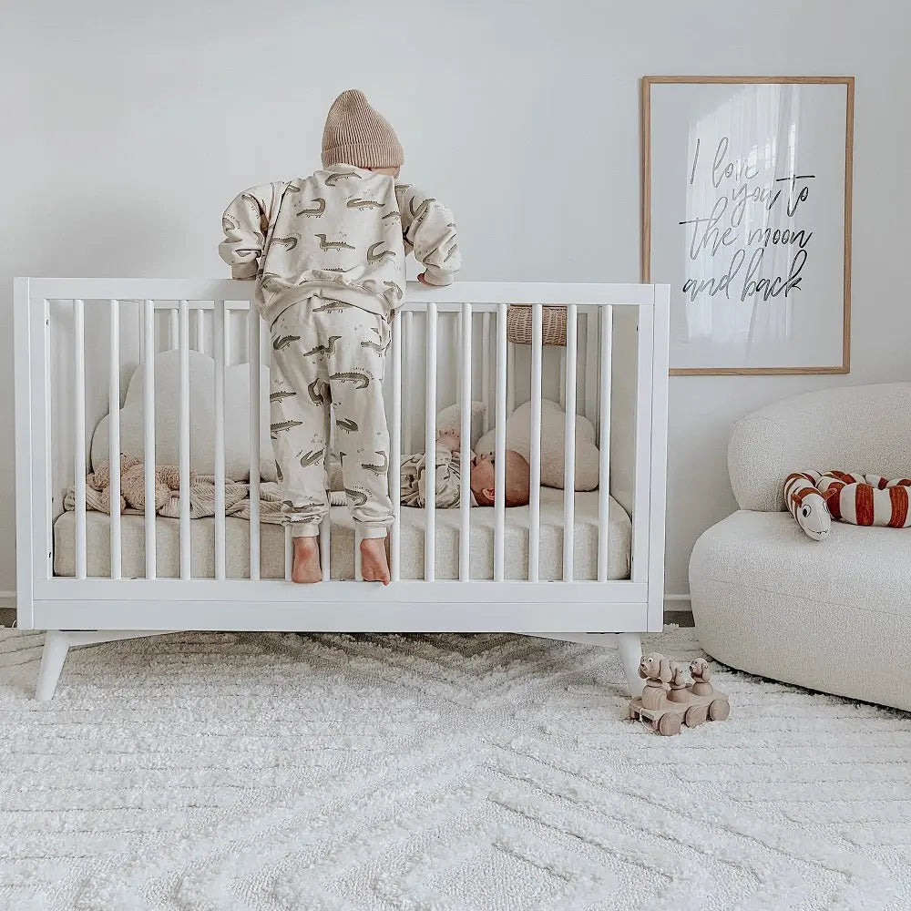 boulevard kids nursery setting including a baby cot